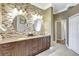 Elegant bathroom showcasing a double vanity, mosaic tile accents, and ample counter space at 4818 88Th E St, Bradenton, FL 34211