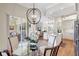 Dining area with a view into the living room and kitchen area at 4818 88Th E St, Bradenton, FL 34211