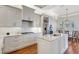 Gourmet kitchen with stainless steel appliances, marble countertops, and custom cabinetry at 4818 88Th E St, Bradenton, FL 34211