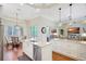 Bright kitchen adjacent to the dining area with pool view at 4818 88Th E St, Bradenton, FL 34211