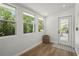 Bright entryway with multiple windows and a stylish basket at 515 N Osprey Ave, Sarasota, FL 34236