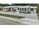 Charming home featuring a modern exterior, metal roof and inviting curb appeal at 515 N Osprey Ave, Sarasota, FL 34236