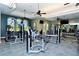 Modern gym offering a variety of exercise equipment and free weights in a spacious layout at 5968 Snowy Egret Dr, Sarasota, FL 34238