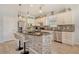 Modern kitchen with stainless steel appliances, granite countertops, and decorative backsplash at 5968 Snowy Egret Dr, Sarasota, FL 34238