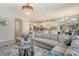 Spacious living room flows into the kitchen and dining area, complemented by stylish furnishings and elegant decor at 5968 Snowy Egret Dr, Sarasota, FL 34238