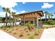 Charming mail kiosk surrounded by lush landscaping and palm trees, offering convenience and curb appeal at 5968 Snowy Egret Dr, Sarasota, FL 34238
