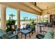 Inviting outdoor patio space with comfortable seating overlooking the pool area at 5968 Snowy Egret Dr, Sarasota, FL 34238