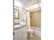 Bathroom with granite sink and tile shower at 6157 Midnight Pass Rd # E73, Sarasota, FL 34242
