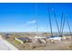 Boats and catamarans resting near the sandy beach on a sunny day. Ideal setting for water sports at 6157 Midnight Pass Rd # E73, Sarasota, FL 34242