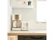 Bright kitchen featuring modern appliances at 6157 Midnight Pass Rd # E73, Sarasota, FL 34242