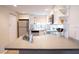 White kitchen with stainless appliances and a large countertop at 6157 Midnight Pass Rd # E73, Sarasota, FL 34242
