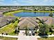 Beautiful home with a three-car garage and serene pond views in a well-maintained community at 635 Chipper Dr, Sun City Center, FL 33573