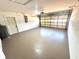 Spacious and clean garage with ample storage and an automatic door opener at 6524 Senegal Palm Way, Apollo Beach, FL 33572