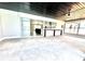 This screened in patio offers an excellent indoor/outdoor space with access to kitchen and covered ceiling with fan at 6524 Senegal Palm Way, Apollo Beach, FL 33572