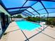 Enjoy the Florida weather in this screened-in pool with a view of canal at 6524 Senegal Palm Way, Apollo Beach, FL 33572