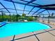 Enjoy the Florida weather in this screened-in pool with a view of the water at 6524 Senegal Palm Way, Apollo Beach, FL 33572