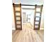 Large walk-in closet with plenty of shelving and space for organization at 6524 Senegal Palm Way, Apollo Beach, FL 33572