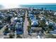 Serene aerial view of a coastal neighborhood with a beautiful view of the ocean at 704 Gladiolus St, Anna Maria, FL 34216