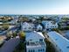Stunning aerial view showcasing the home's location near the ocean at 704 Gladiolus St, Anna Maria, FL 34216