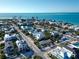 Gorgeous aerial view of coastal neighborhood homes with stunning ocean views at 704 Gladiolus St, Anna Maria, FL 34216
