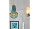 Foyer featuring a decorative chandelier, wall sconces, and a framed pelican picture at 704 Gladiolus St, Anna Maria, FL 34216