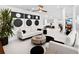 Bright living room featuring contemporary decor, modern furnishings, and an open-concept design at 7647 Sanderling Rd, Sarasota, FL 34242