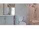 Contemporary bathroom with glass-enclosed shower, modern toilet and floating vanity at 791 Saint Judes Dr N, Longboat Key, FL 34228