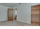 Bedroom with a walk-in closet and en suite bathroom at 791 Saint Judes Dr N, Longboat Key, FL 34228
