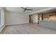 Spacious living area with a kitchen island and modern appliances at 791 Saint Judes Dr N, Longboat Key, FL 34228