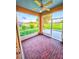 Enjoy the spacious screened lanai with brick flooring and golf course views at 834 Springwood Cir, Bradenton, FL 34212