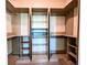 Spacious walk-in closet with ample hanging and shelving space for organized storage at 834 Springwood Cir, Bradenton, FL 34212