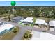 Aerial view of the residential community, showcasing its landscaped grounds, multiple residences, and proximity to amenities at 842 Jolanda Cir, Venice, FL 34285