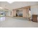 Open auditorium features a stage with curtains, American flag, and ample seating for community events at 842 Jolanda Cir, Venice, FL 34285