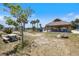 The community area includes a tiki hut with picnic tables and common space at 842 Jolanda Cir, Venice, FL 34285