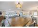 Open-concept living space flows from dining area to living room at 842 Jolanda Cir, Venice, FL 34285