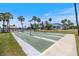 Shuffleboard courts and clubhouse are ready for a friendly competition at 842 Jolanda Cir, Venice, FL 34285