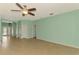 Large living room with tile flooring, neutral walls, and an open floor plan at 9022 Coachman Dr, Venice, FL 34293