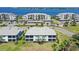 Charming condo featuring a screened in porch and lush landscaping, with serene waterfront views at 1017 Tidewater Shores Loop # 1017, Bradenton, FL 34208