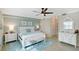Calm main bedroom with soft colors, a comfortable bed, and elegant furnishings for a relaxing retreat at 1017 Tidewater Shores Loop # 1017, Bradenton, FL 34208