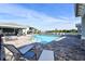 Relaxing community pool with comfortable lounge chairs, shaded areas, and scenic views at 1017 Tidewater Shores Loop # 1017, Bradenton, FL 34208