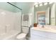Bathroom featuring a white vanity, toilet and tub at 10202 L Pavia Blvd # 10202, Venice, FL 34292