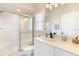 Clean bathroom with white vanity, toilet and glass enclosed shower at 10202 L Pavia Blvd # 10202, Venice, FL 34292