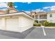 Charming condo featuring a private garage, balcony, and well-maintained landscaping for an inviting curb appeal at 10202 L Pavia Blvd # 10202, Venice, FL 34292