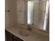 Bright bathroom featuring a vanity with framed mirrors and ample counter space at 11202 Tralee Dr, Riverview, FL 33569