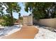 Spacious backyard features a container and plenty of space for outdoor activities and storage at 1212 Princeton Ave, Bradenton, FL 34207