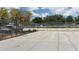 Community basketball court area with basketball hoop and chainlink fence at 1212 Princeton Ave, Bradenton, FL 34207