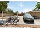 Large driveway with boat trailer and covered vehicle, offering ample parking and storage space at 1212 Princeton Ave, Bradenton, FL 34207
