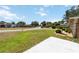 Well-manicured front lawn featuring vibrant greenery and a meticulously maintained landscape at 1212 Princeton Ave, Bradenton, FL 34207