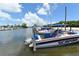 Marina view featuring boats docked in the water with vibrant colors, enhanced by a clear sky backdrop at 1212 Princeton Ave, Bradenton, FL 34207