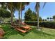 Charming park setting with picnic tables and lush landscaping, offering a relaxing outdoor experience at 1212 Princeton Ave, Bradenton, FL 34207